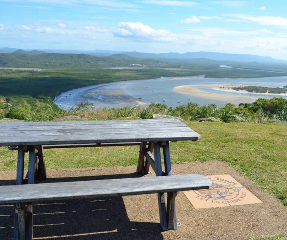 Grassy hill picnic tables located at Cooktown lookout 